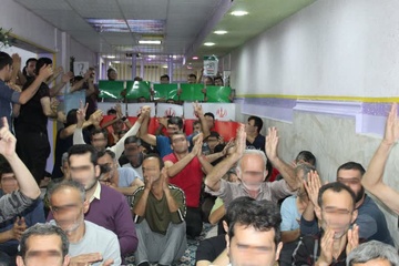 تصاویر: تماشای بازی کشورمان ایران با ولز در میان مددجویان «زندان لاهیجان»