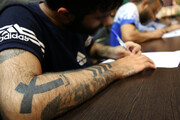 شرکت زندانیان زندان قم در امتحانات مقاطع تحصیلی