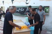 برپایی ایستگاه صلواتی و توزیع غذای نذری در روز عاشورا برای مددجویان زندان دشتی