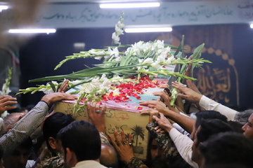 آئین تشییع و وداع با پیکر پاک شهید دفاع مقدس در زندان مرکزی مشهد