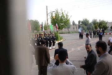 پرچم امام رضا در زندان همدان