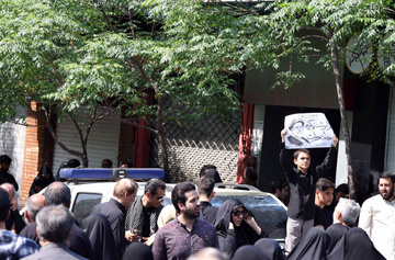 روایت تصویری عکاس سازمان زندان‌ها از آئین تشییع «شهدای خدمت» در شهر تهران