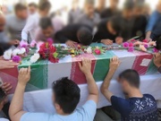 مراسم وداع با پیکر مطهر شهید گمنام در زندان شهرستان کاشمر