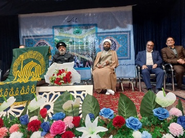 پرچم متبرک ضریح منور و نورانی امام رضا(ع) در زندان تبریز