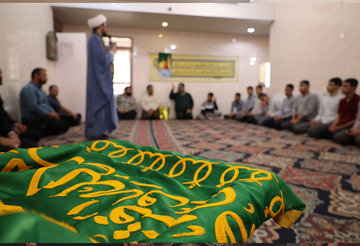 کبوتر دل زندانیان چهارمحال و بختیاری پرجم امام رضا (ع) را طواف کردند