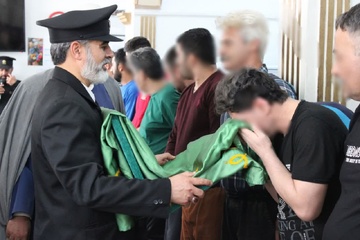 آئین پرچم گردانی بارگاه منور رضوی امام رضا(ع) در زندانهای خراسان رضوی