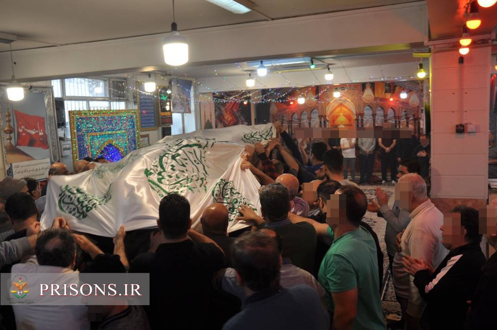 پرچم متبرک ضریح امام علی علیه‌السلام در بازداشتگاه اوین